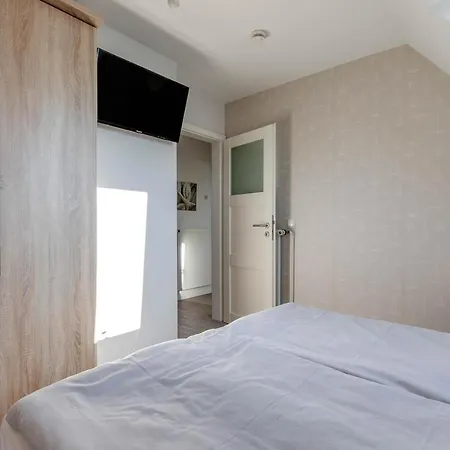 Haus Hoch Am Wind 8 Апартаменты Бюзум