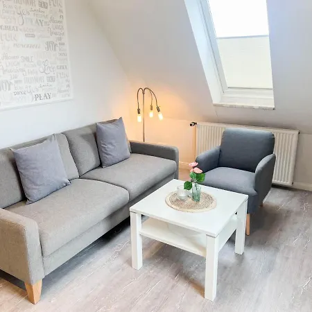 Haus Hoch Am Wind 8 Апартаменты Бюзум